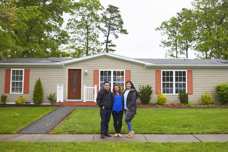 The Martinez family stands in front of their home in New Jersey. During a speech at her graduation, Alondra said to her parents: 