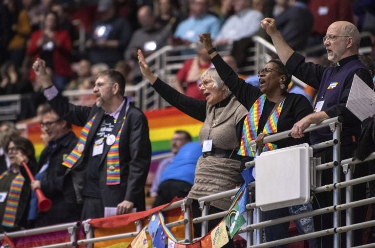 Protestors chant during the United Methodist Church's special session of the general conference in St. Louis, Tuesday, Feb. 26, 2019. America's second-largest Protestant denomination faces a likely fracture as delegates at the crucial meeting move to strengthen bans on same-sex marriage and ordination of LGBT clergy.
(Sid Hastings/AP Photo)