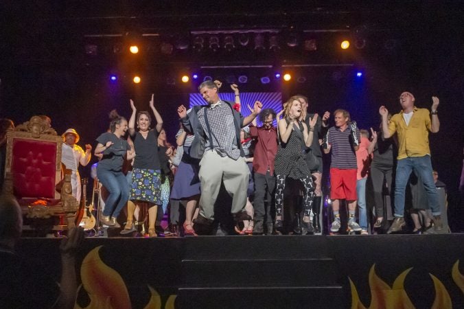 Performers stomp on the stage at the show's conclusion. (Jonathan Wilson for WHYY)