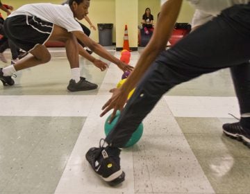 Students at Philadelphia’s Constitution High School face off during dodgeball. (Kimberly Paynter/WHYY)