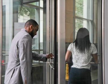 Jovan Weaver, the former principal of Philadelphia’s Mastery Charter School at John Wister Elementary in Germantown enters court for a preliminary hearing on Tuesday morning. Weaver is charged with vehicular homicide.  (Kimberly Paynter/WHYY)