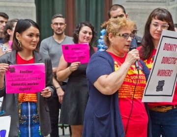 Activists, domestic workers, and government representatives gather outside City Hall Thursday morning before introducing the Domestic Workers' Bill of Rights legislation to city council. (Kimberly Paynter/WHYY)