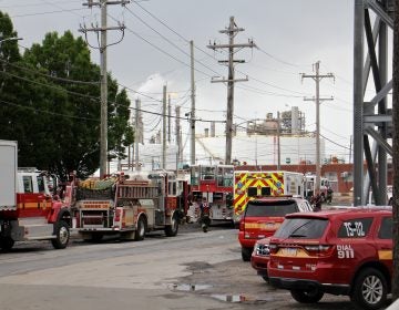 Philadelphia firefighters respond to the scene of a fire at the Philadelphia Energy Solutions refinery.