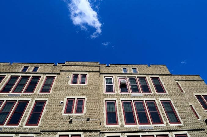 Exterior view shows the current state of Belmont Charter School as maintenance work progresses to ready the facilities in the Belmont neighborhood for the new school year. (Bastiaan Slabbers for WHYY)