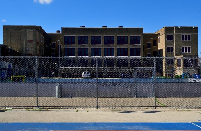 Exterior view shows the current state of Belmont Charter School as maintenance work progresses to ready the facilities in the Belmont neighborhood for the new school year. (Bastiaan Slabbers for WHYY)