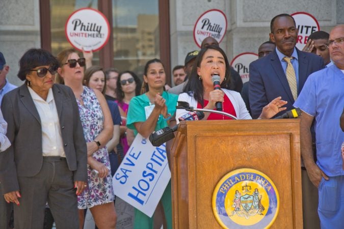 Councilwoman Helen Gym speaks at a rally to save Hahnemann hospital from closing at City Hall. (Kimberly Paynter/WHYY)