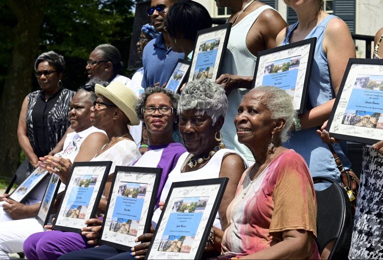 Award recipients pose for pictures after a ceremony at the inaugural Unity Day at Vernon Park, in Germantown, on Saturday. (Bastiaan Slabbers for WHYY)
