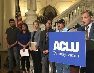 PA ACLU Legal Director Vic Walczak speaks at a press conference announcing the lawsuit alongside fellow attorneys and plaintiffs in the case. (Katie Meyer/WITF)