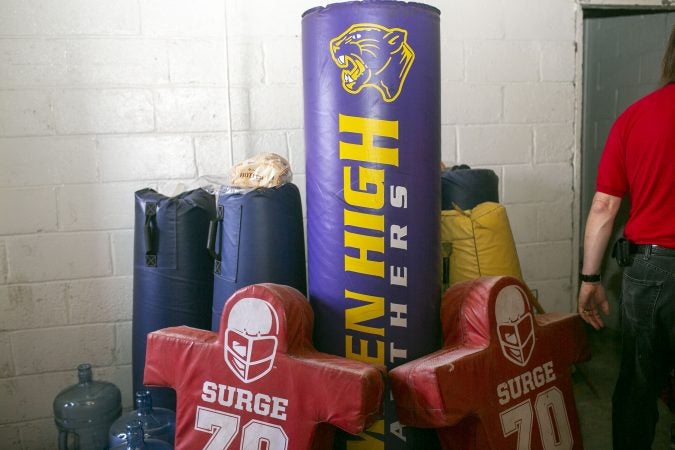 A group tours the Camden High School athletic facilities on Thursday, June 6, 2019 (Miguel Martinez for WHYY)