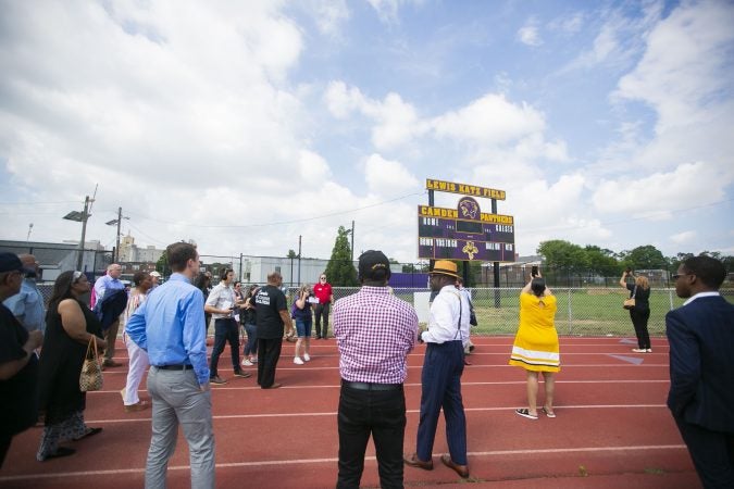 A group tours the Camden High School athletic facilities on Thursday, June 6, 2019 (Miguel Martinez for WHYY)