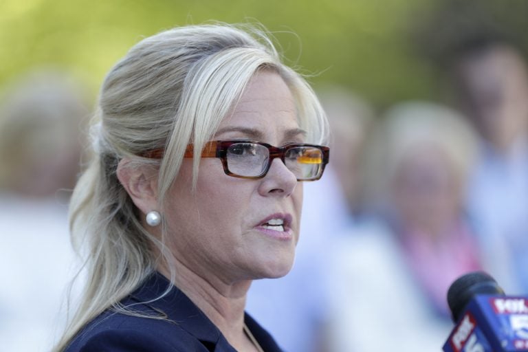 Bridget Kelly, the former deputy chief of staff for former New Jersey Gov. Chris Christie, reads a statement after exiting the Martin Luther King, Jr., Federal Courthouse following a re-sentencing hearing, Wednesday, April 24, 2019, in Newark, N.J. (Julio Cortez/AP Photo)