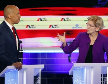 Democratic presidential candidate Sen. Elizabeth Warren, D-Mass., gestures towards New Jersey Sen. Cory Booker, during a Democratic primary debate hosted by NBC News at the Adrienne Arsht Center for the Performing Arts, Wednesday, June 26, 2019, in Miami. (Wilfredo Lee/AP Photo)