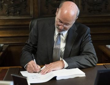 Pennsylvania Gov. Tom Wolf signs the main appropriations bill in a $34 billion budget package that passed the Legislature this week at the state Capitol in Harrisburg, Pa., Friday, June 28, 2019. (Matt Rourke/AP Photo)