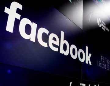 Facebook says it plans to make advertisements for U.S. jobs and credit products searchable for all users. The databases expand on a legal settlement reached in March over discrimination blamed on Facebook’s highly customized ad-targeting. (Richard Drew/AP Photo)