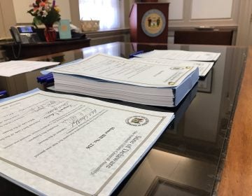 Gov. John Carney signed Delaware’s $4.45 billion budget Tuesday afternoon in his Dover office. (Courtesy of Carney staff)