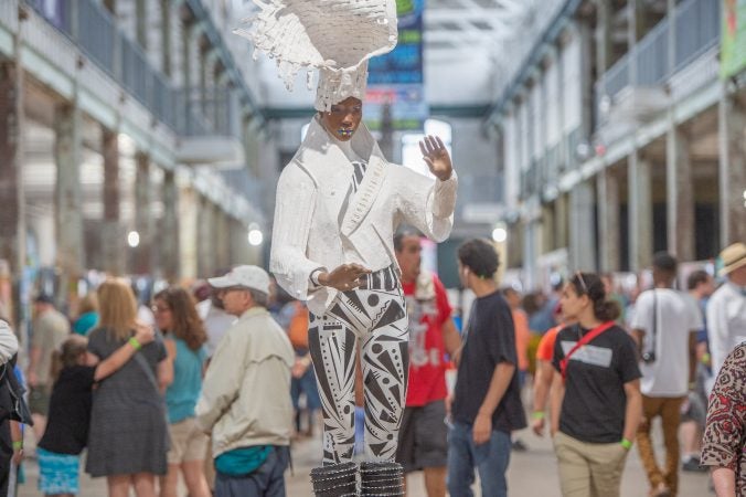 Jazz, a sculpture by Clifford Ward stands in the central hall of the Roebling Wire Works building during the 13th annual Art All Night festival in Trenton. (Jonathan Wilson for WHYY)