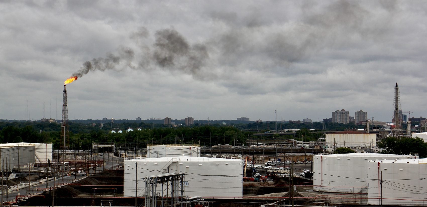 Smoke rising from the refinery