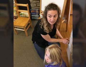 Cooperative Nursery School director Leah Corsover with a student. (Paul Jablow/The Notebook)