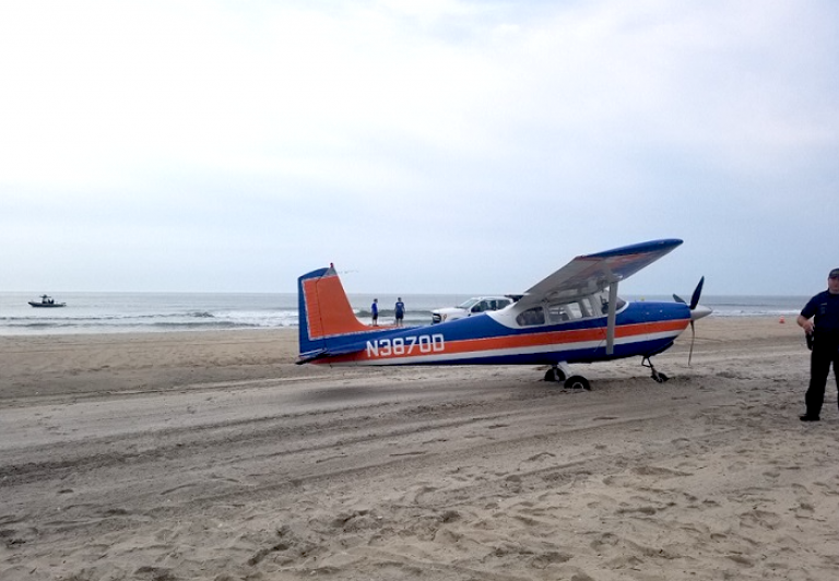 A plane on an Ocean City beach after an emergency landing Saturday morning. (Image courtesy of the Ocean City Police Department)