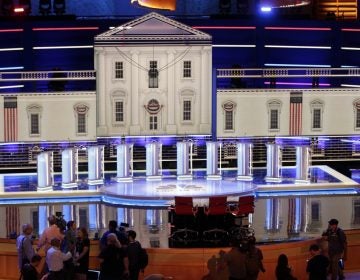 Members of the media gather for a walk-through of the stage set-up for the first democratic debate, Wednesday, June 26, 2019. Ten presidential candidates, led by Sen. Elizabeth Warren, are set to converge on the debate stage on the first night of Democratic debates to offer their pitches to the American people and attempt a breakout moment for their campaigns. (Marta Lavandier/AP Photo)