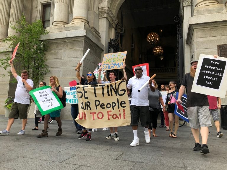 Protesters gathered at city hall opposing the city's smoking ban in inpatient addiction treatment facilities (Nina Feldman/WHYY)