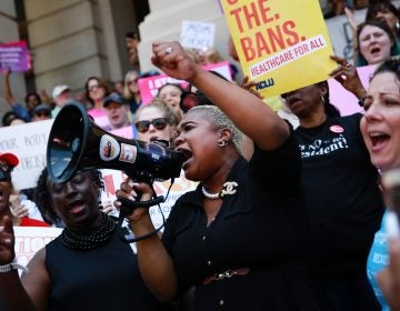 Georgia state Rep. Erica Thomas speaks during a protest against recently passed abortion-ban bills at the state Capitol on May 21 in Atlanta. (Elijah Nouvelage/Getty Images)