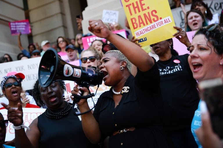 Georgia state Rep. Erica Thomas speaks during a protest against recently passed abortion-ban bills at the state Capitol on May 21 in Atlanta. (Elijah Nouvelage/Getty Images)