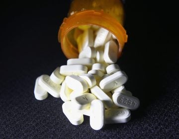 Oxycodone pain pills prescribed for a patient with chronic pain are photographed in 2016. Attorneys unveiled a plan Friday morning which they say would move the nation closer to a global settlement of lawsuits stemming from the deadly opioid crisis. (John Moore/Getty Images)