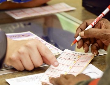 Proceeds from the Pennsylvania Lottery go toward programs for seniors. But lawmakers are worried unregulated games are cutting into that revenue. (Nati Harnik/AP Photo)