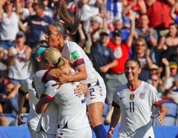 U.S. players celebrate after teammate Julie Ertz scored their side's second goal during the Women's World Cup Group F soccer match between United States and Chile at Parc des Princes in Paris, France on Sunday. (Alessandra Tarantino/AP Photo)