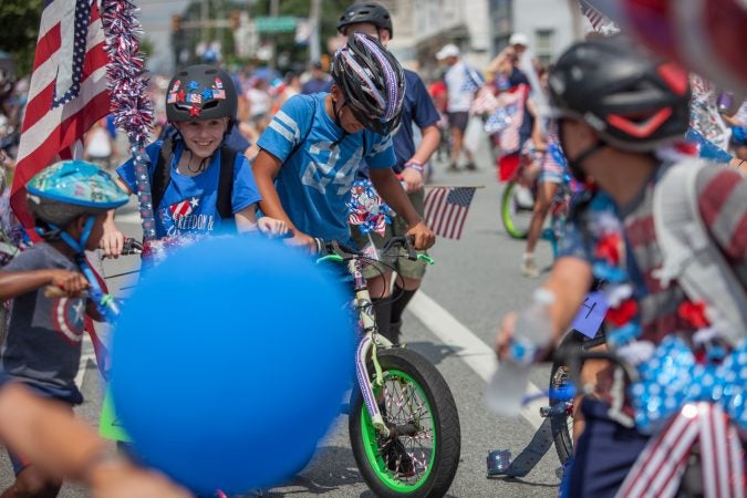 The bike brigade makes their way through the annual Marple Newtown Fourth of July parade. (Emily Cohen for WHYY)