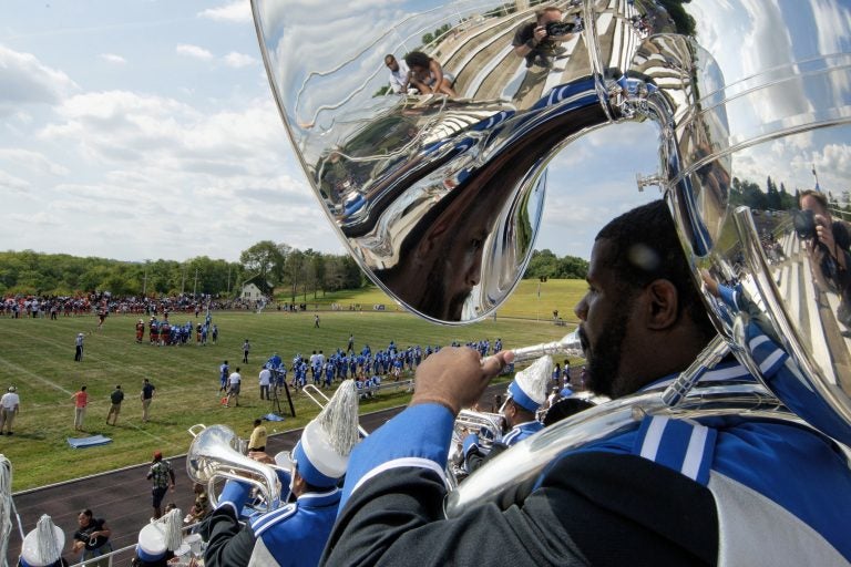 Members of the Cheyney University marching band play in the stands during a football game against Lincoln University. (Bastiaan Slabbers for WHYY)