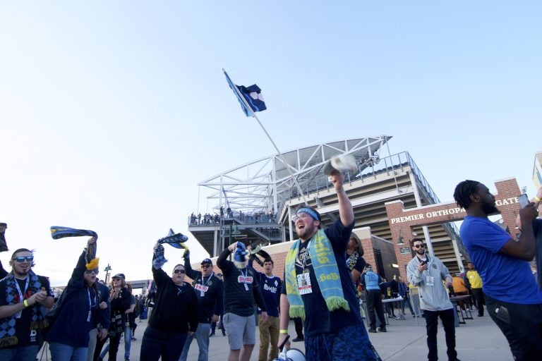 Erick Jusino, of Philadelphia leads a chant on the bullhorn at the Philadelphia Union home game against FC Dallas at Talen Energy Stadium, in Chester, Pennsylvania, on April 6, 2019. (Bastiaan Slabbers for WHYY)