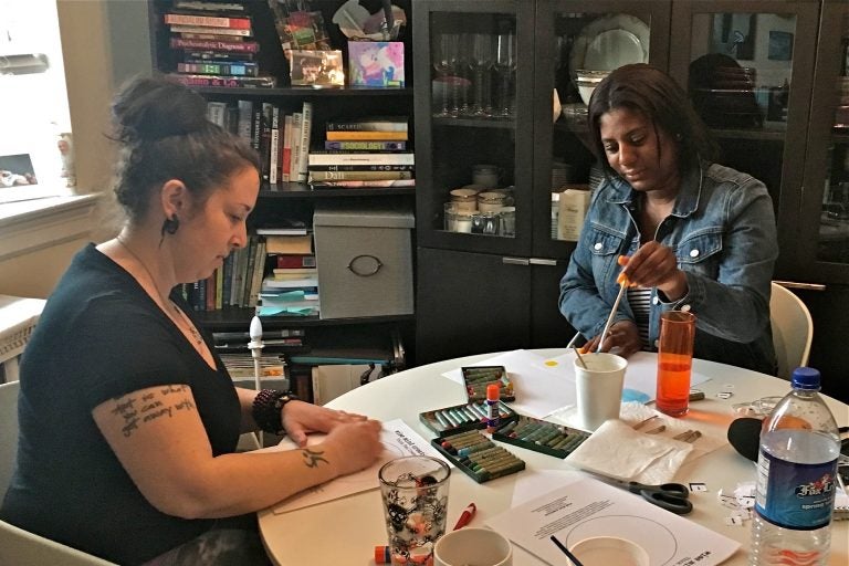 Art therapist Jessica Masino Drass (left) works with Derricia Smith. (Anne Hoffman)