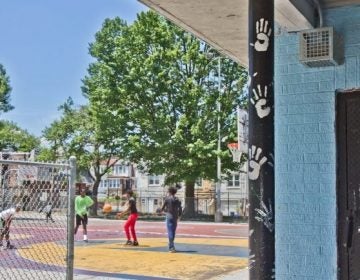 A sonic device is seen (at top right) at Barrett Playground in Philadelphia. Thirty parks in the city have the devices, which emit a constant, high-pitched noise that only teenagers and young adults can hear. (Kimberly Paynter/WHYY)