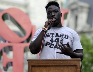 Cheick Diawara speaks during a Stand 4 Peace anti gun-violence rally in Love park (Bastiaan Slabbers for WHYY)