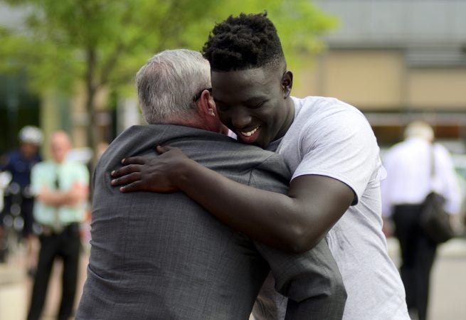 Mayor Jim Kenney and Cheick Diawara at a Stand 4 Peace anti gun-violence rally in Love park. (Bastiaan Slabbers for WHYY)