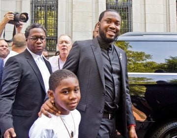 Rapper Robert Rihmeek Williams “Meek Mill” with his son, Rihmeek Williams. Mill appeared in Superior Court Tuesday. His lawyers are arguing for a retrial. (Kimberly Paynter/WHYY)