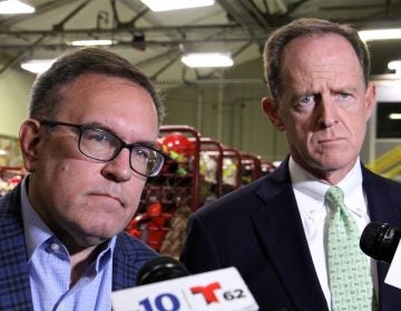 Environmental Protection Agency administrator Andrew Wheeler (left) and U.S. Sen. Pat Toomey (R-Pa.) visit Monroe refinery in Trainor, Pa., to discuss eliminating the federal regulation that requires blending ethanol with gasoline. (Emma Lee/WHYY)