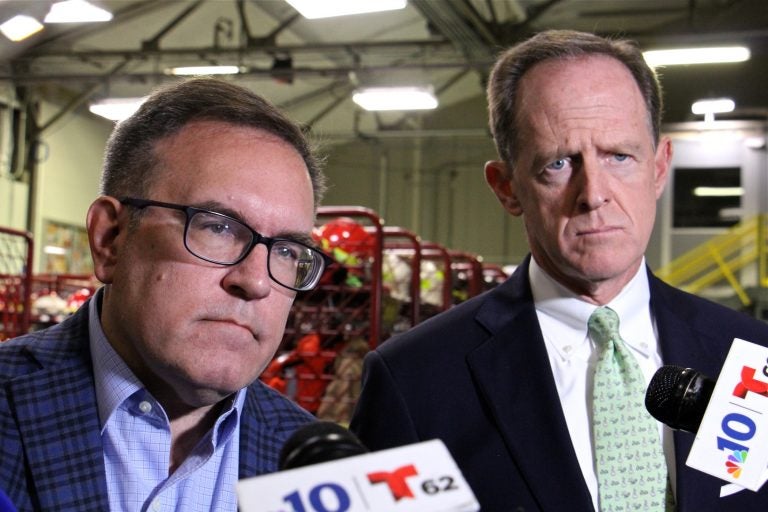 Environmental Protection Agency administrator Andrew Wheeler (left) and U.S. Sen. Pat Toomey (R-Pa.) visit Monroe refinery in Trainor, Pa., to discuss eliminating the federal regulation that requires blending ethanol with gasoline. (Emma Lee/WHYY)