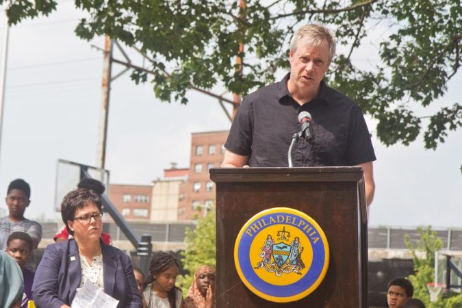 Sculptor Brian McCutcheon talks about his time living in South Philadelphia before the unveiling of his work “MVP” at Smith Playground in South Philadelphia. (Kimberly Paynter/WHYY)