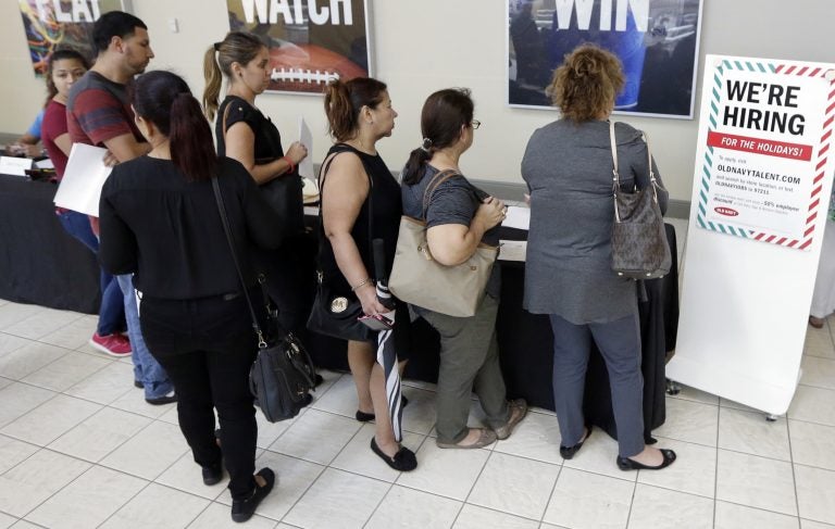 In this Tuesday, Oct. 3, 2017, photo, job seekers wait in line at a job fair (Alan Diaz/AP Photo)