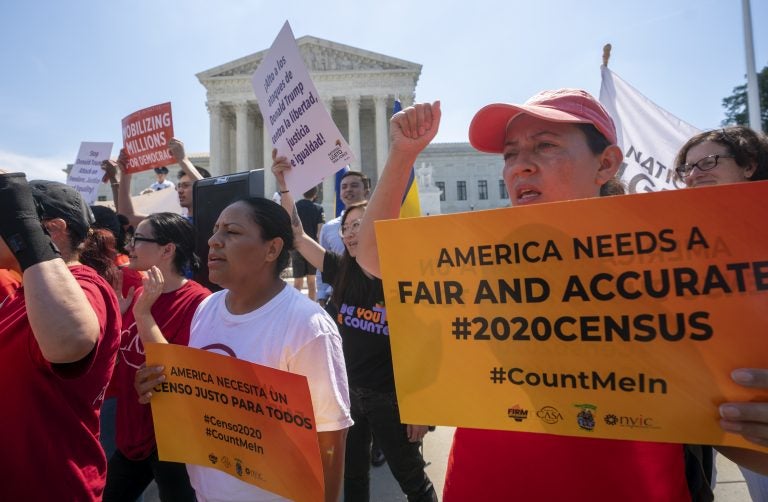 In this June 27, 2019, file photo, Demonstrators gather at the Supreme Court as the justices finish the term with key decisions on gerrymandering and a census case involving an attempt by the Trump administration to ask everyone about their citizenship status in the 2020 census, on Capitol Hill in Washington. The Justice Department said Tuesday that the 2020 Census is moving ahead without a question about citizenship. (J. Scott Applewhite/AP Photo, File)