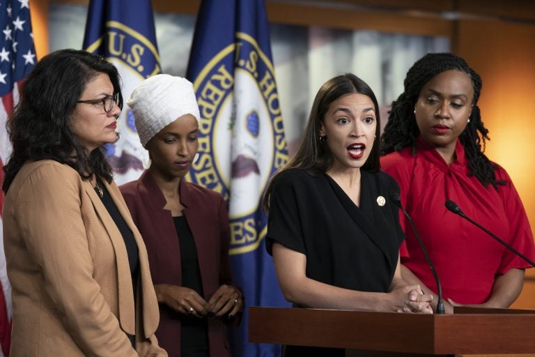 U.S. Rep. Alexandria Ocasio-Cortez, D-N.Y., speaks as, from left, Rep. Rashida Tlaib, D-Mich., Rep. Ilhan Omar, D-Minn., and Rep. Ayanna Pressley, D-Mass., listen during a news conference at the Capitol in Washington, Monday, July 15, 2019. (J. Scott Applewhite/AP Photo)