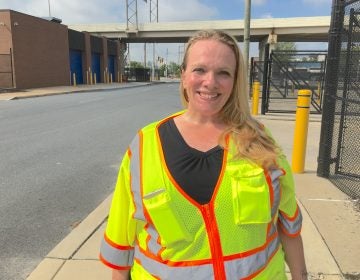 Tina Hylton says cleaning up trash on the streets of Wilmington has helped her stay sober. She’s part of a pilot program called Work-a-Day Earn-a-Pay that’s being expanded statewide. (Mark Eichmann/WHYY)