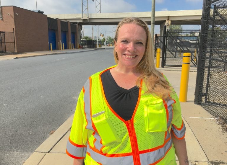 Tina Hylton says cleaning up trash on the streets of Wilmington has helped her stay sober. She’s part of a pilot program called Work-a-Day Earn-a-Pay that’s being expanded statewide. (Mark Eichmann/WHYY)
