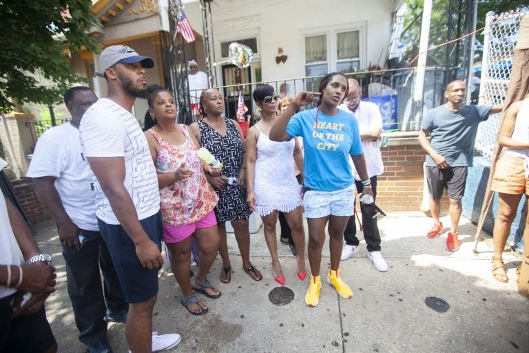 A group of community leaders gather at Baker's Playground for a peace rally on Saturday, July 20, 2019. (Miguel Martinez/WHYY)