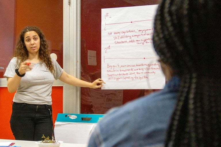 Kat Engleman presents to members of the Youth United for Change alumni chapter on North Front Street on June 21, 2019. (Photo by Mohammad Alkhalaf)