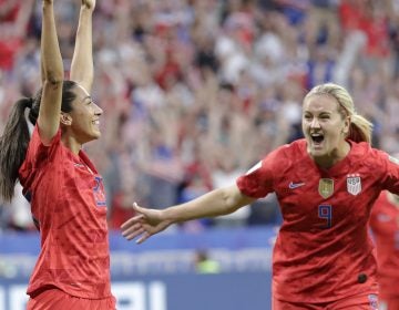 Christen Press (left) celebrates after scoring the U.S.'s first goal during the Women's World Cup semifinal against England. The U.S. won 2-1. (Alessandra Tarantino/AP)