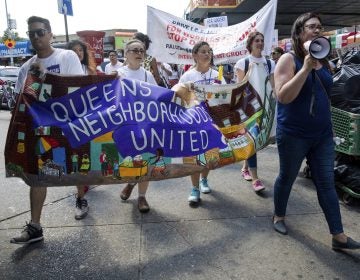 Hundreds of people march in New York in opposition to the Trump administration's plans to continue with raids to catch immigrants in the country illegally in Queens on Sunday. (Julius Constantine Motal/AP Photo)